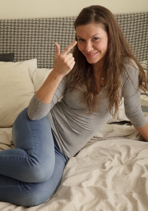 Bitch takes pink dress off and expands pussy lips with fingers exposing womb