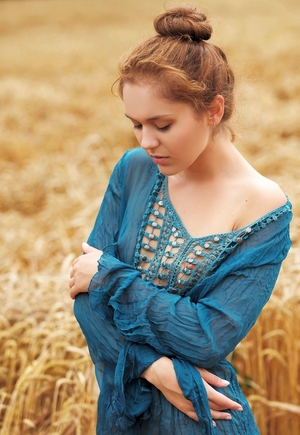 Farmer broad with red hair looks also sexy and appetizing to be dressed