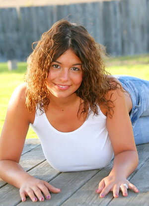 Delicious curly-haired Becca Stein is ready to show her enormous titties outdoors