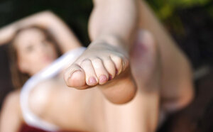 Jaw-dropping chick is wetting T-shirt to shows off sizeable breasts and pierced love hole