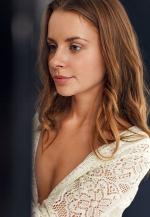 Immature broad with beautiful face and furthermore smile likes to read books being naked