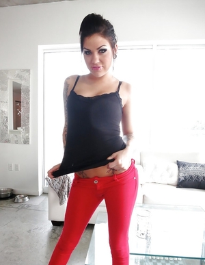 Chick with ponytail has a tattoo on ass and it looks like somebody kissed her