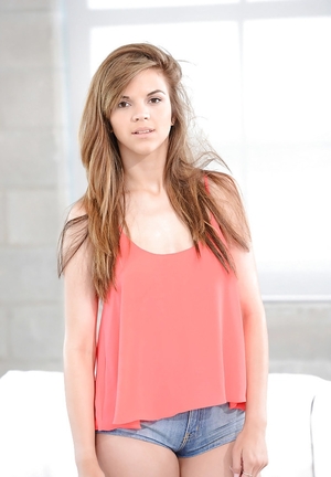 Modest kitten Brooke Lynn under outfit hides perky boobs and furthermore bald vag