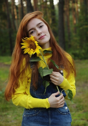 Ginger with red hair on the head and moreover pubis undresses at the picnic