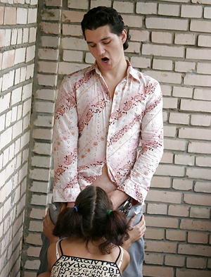 Russian schoolgirl with a couple of pigtails lets man pound her on the public balcony
