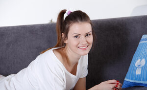 Nice-looking babe in sexy socks is petting her vag openly