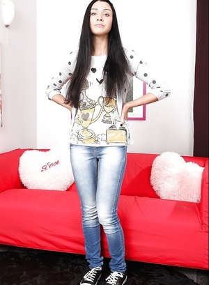 18-19 year old girl with long black hair poses alone at home without taking clothes off