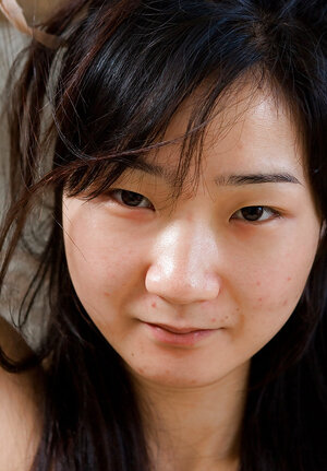 Aislin the adorable Far eastern is showing off her nips and plus beyond