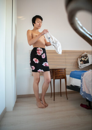 Short hair girl is showing her little titties and long legs