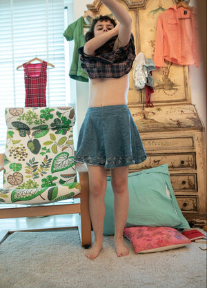 Adorable chick in a denim skirt is going to showcase her bush too