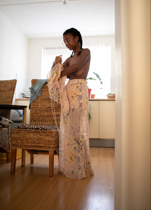 Black gal with natural breasts is here to show her body