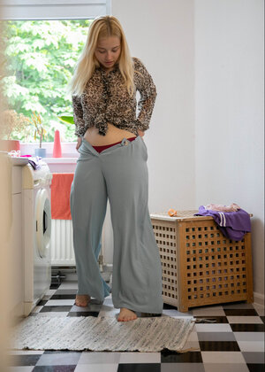 Tubby blonde floozy Bianca B is showing off for the camera too