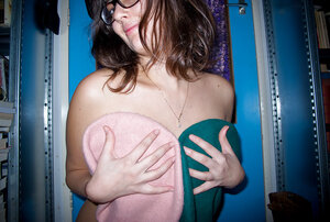 Slightly fat chick Ariel D shows her natural boobies in the dark