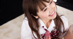 Adorable Japanese chick taking care of his juicy boner as well