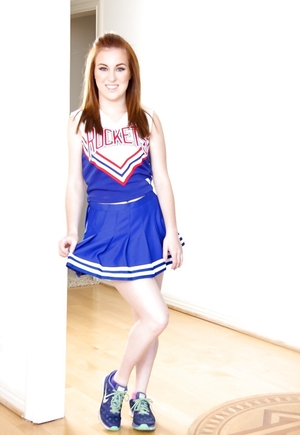 Pale-skinned broad bought sexy cheerleader uniform for hot striptease