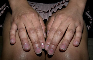 Hot brunette climaxes with her cunt exposed in a short skirt