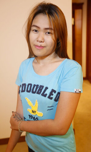 Thai broad in sexy panties showing off her titties before sex