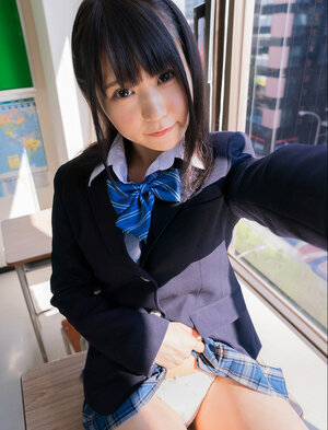 Bored schoolgirl spreads her legs to take images of her tight pink slit