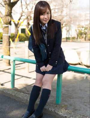 Oriental schoolgirl takes panties off ready to get her booty spanked