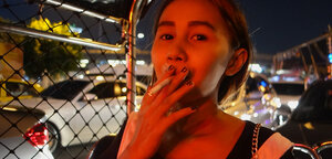 Edgy Thai kitten named Puy is going to smoke and tease in overalls