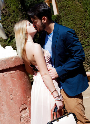 Blonde Aria Logan rides her partner in cowgirl style outdoors