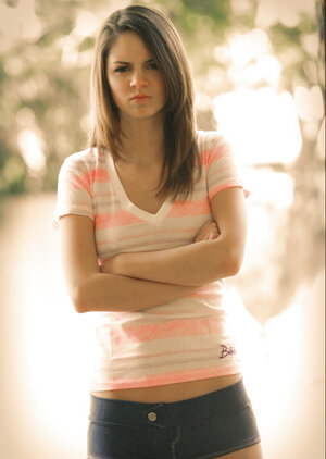 Long-legged performer Aspen Martin shows off her tight booty