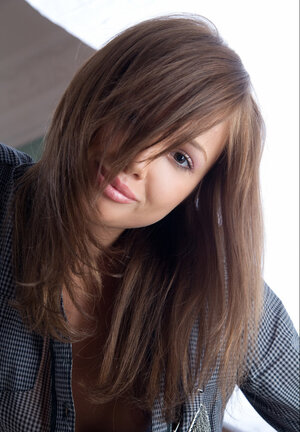 Adorable teenage Michaela A enjoys exposing her pussy in a solo