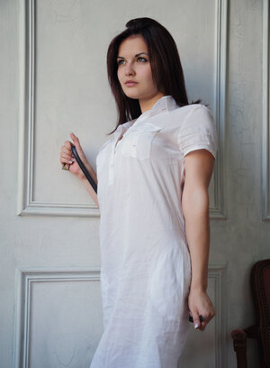 Good-looking brunette Dulcia enjoys stripping and showing off her stretched love hole