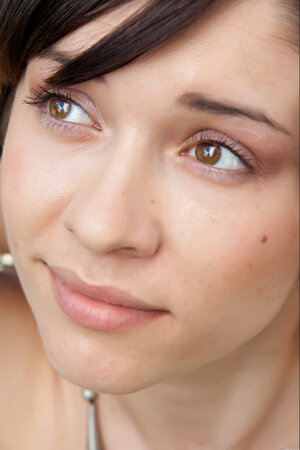 Katy C shows off her splendid boobs outdoors while naked