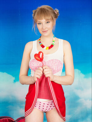 Limona flashes her sweet lingerie before getting naked