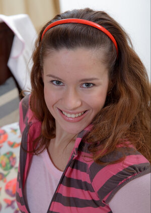 Redhead Emuna grimaces taking flag pole in tight pussy