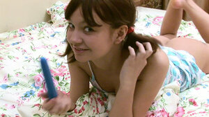 Nastya D plays with her splendid titties and additionally toys her wet pussy