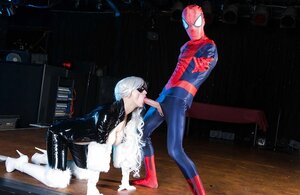 Spider-man makes love platinum blonde villain in latex showing why he is a superhero