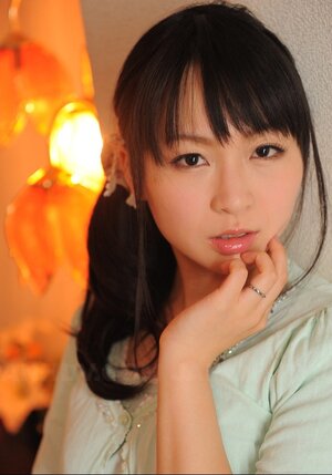 Far eastern girl has a hairy pussy but only husband can see it so she poses dressed up