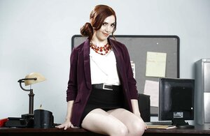 Nifty office girl satisfies viewers taking clothes off and posing with shoes on