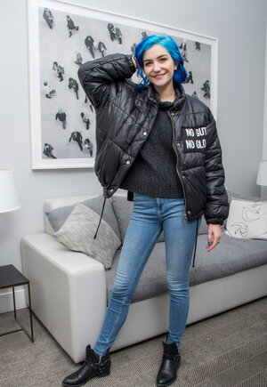 Goth kitten with blue hair willingly strips running into her nice titties for the camera