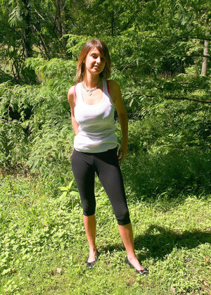 Slender hussy with sexy piercing shows her giant tits on a sunny day outdoors