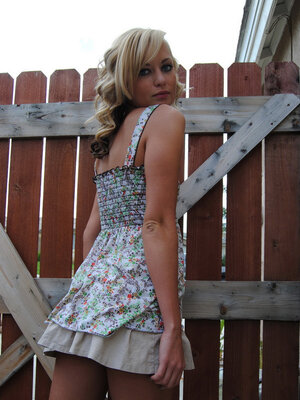 Slutty 18-19 year old blonde teases with her little tits and bald fuck hole outdoors