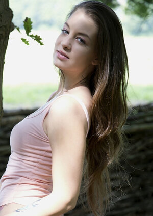 Charming Hungarian girl is always glad to take part in a undressed image session