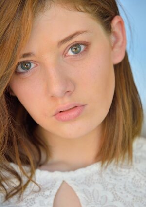 Bitch in a long dress takes red shoes off and additionally fondles vag with its high heel