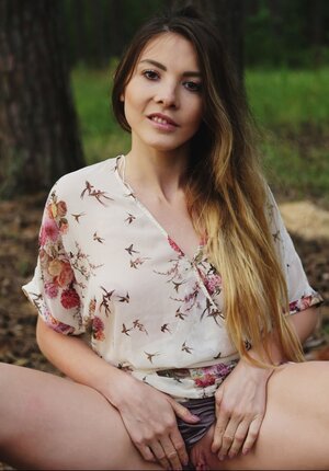 Ukrainian girl chooses a secluded place in the forest and starts playing with twat