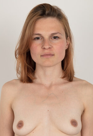 Ginger with little boobs deletes clothes but keeps secret something under panties