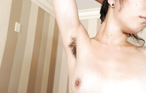 Gal with bushy armpits & slit gives enjoyment to man with shaggy chest