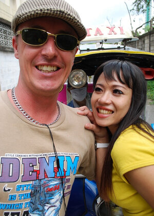 Lascivious Eastern girl in yellow T-shirt and jeans finds a dude who pays for posing