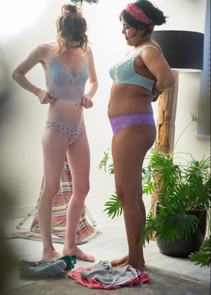 Arab babe in a headband and nerdy roommate oftentimes put on clothes together