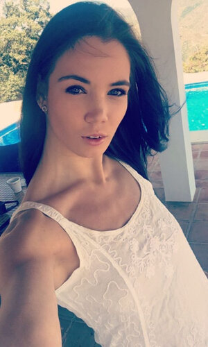 Russian takes picks of flat chest with clothes on and furthermore without for her man to see