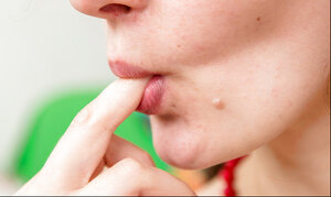 Pale kitten Irina takes off floral dress and moreover inserts red beads in the wet love hole