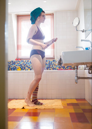 Nerdy gal with a towel on head gives debauched roommate nice reason for jerking